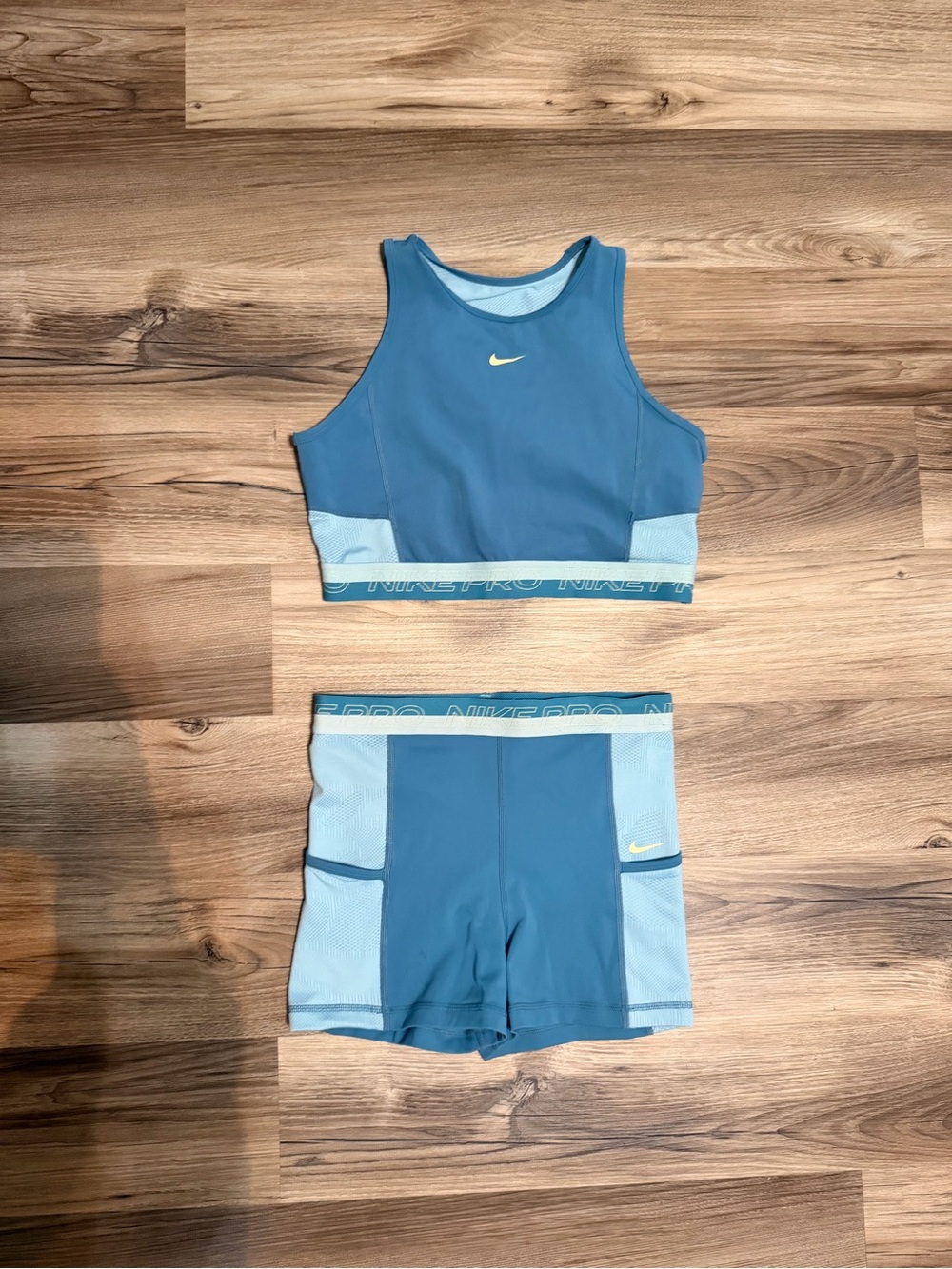 Nike Blue Two-Tone Crop Tank and Shorts Set with Yellow Swoosh